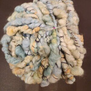 Hand spun art yarn, new, made with super fine wool, and cotton for ply, 1.7oz.